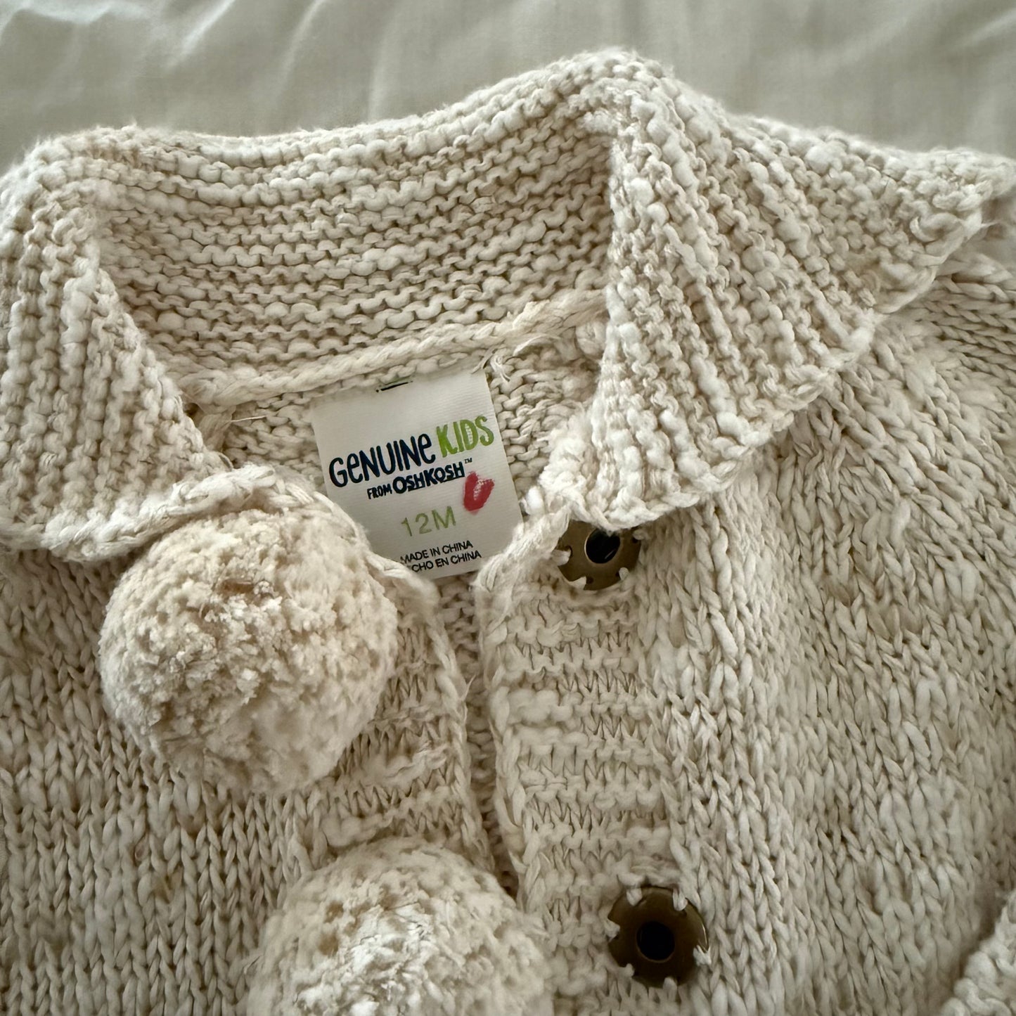 Size 12 months | Oshkosh pom pom sweater